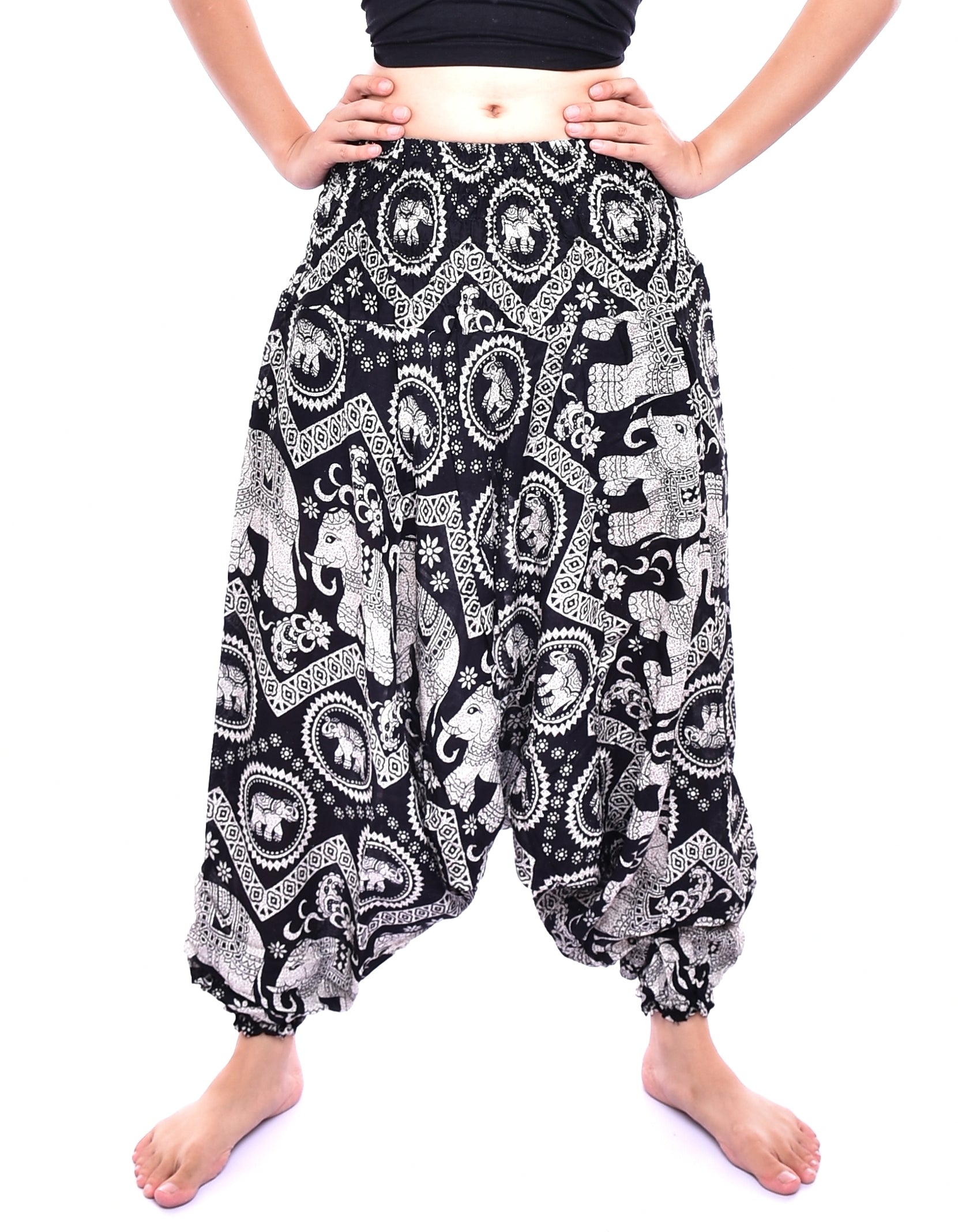Bohotusk Black Elephant Print Low Crotch Harem Pants for women, showcasing a unique design with a smocked waist and external pocket.