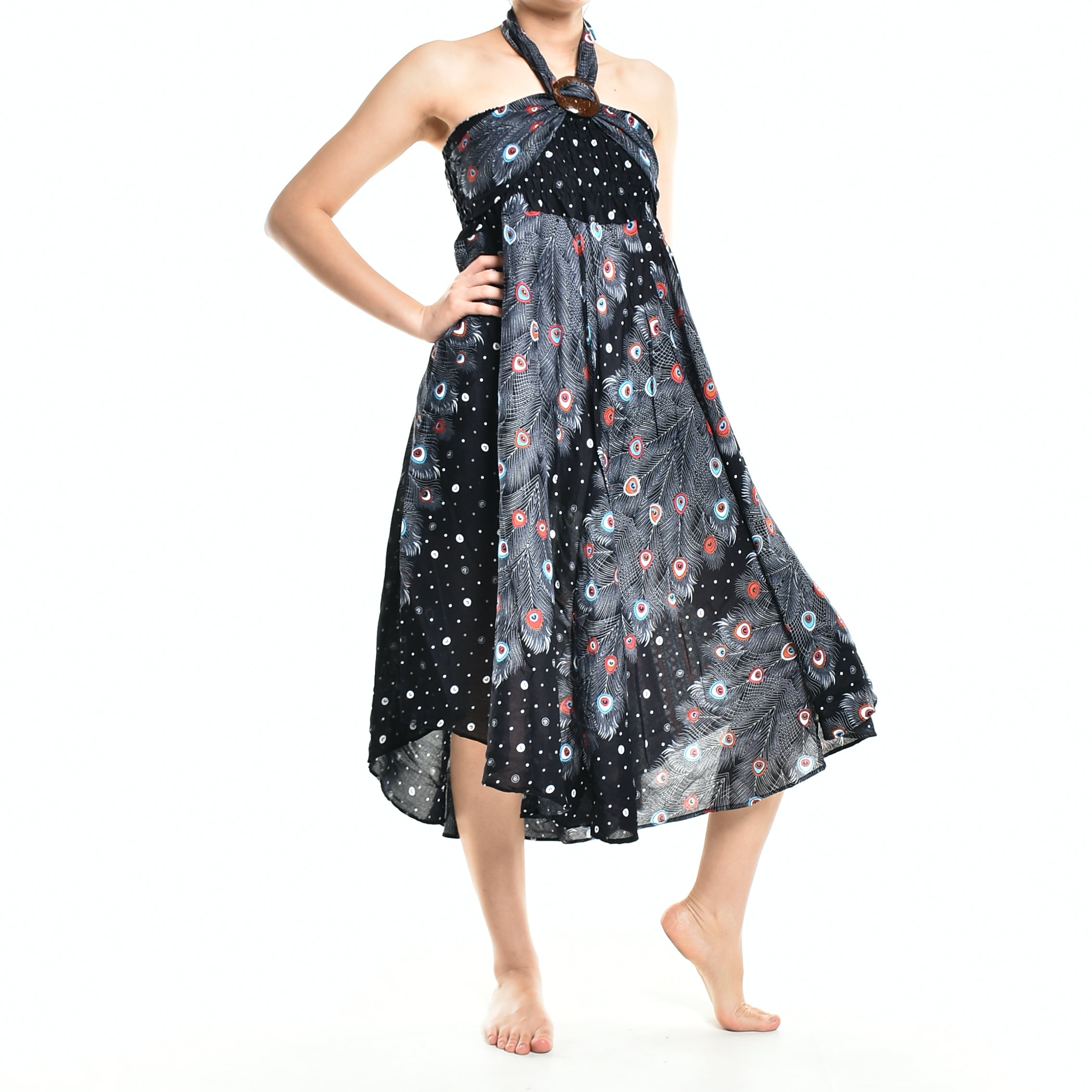 Bohotusk Black Peacock Long Skirt featuring a coconut buckle and elasticated smocked waist, styled elegantly on a model.