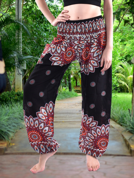 Bohotusk Black Thai Flower Print Women's Trousers with elasticated smocked waist, showcasing a vibrant floral design and comfortable fit.