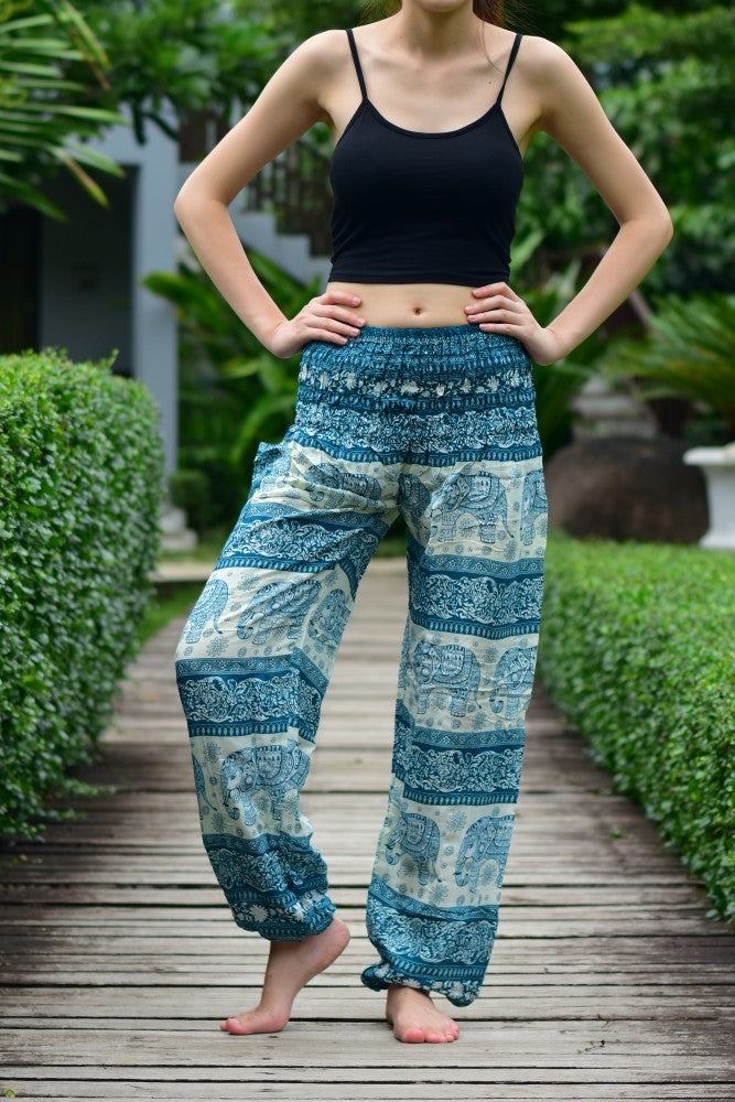 Bohotusk Green Elephant Herd Print Women's Trousers with elasticated smocked waist, showcasing vibrant colors and unique design.