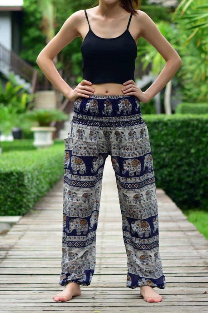Bohotusk Navy Blue Elephant Savannah Print trousers with elasticated smocked waist, showcasing a vibrant elephant design and comfortable fit.
