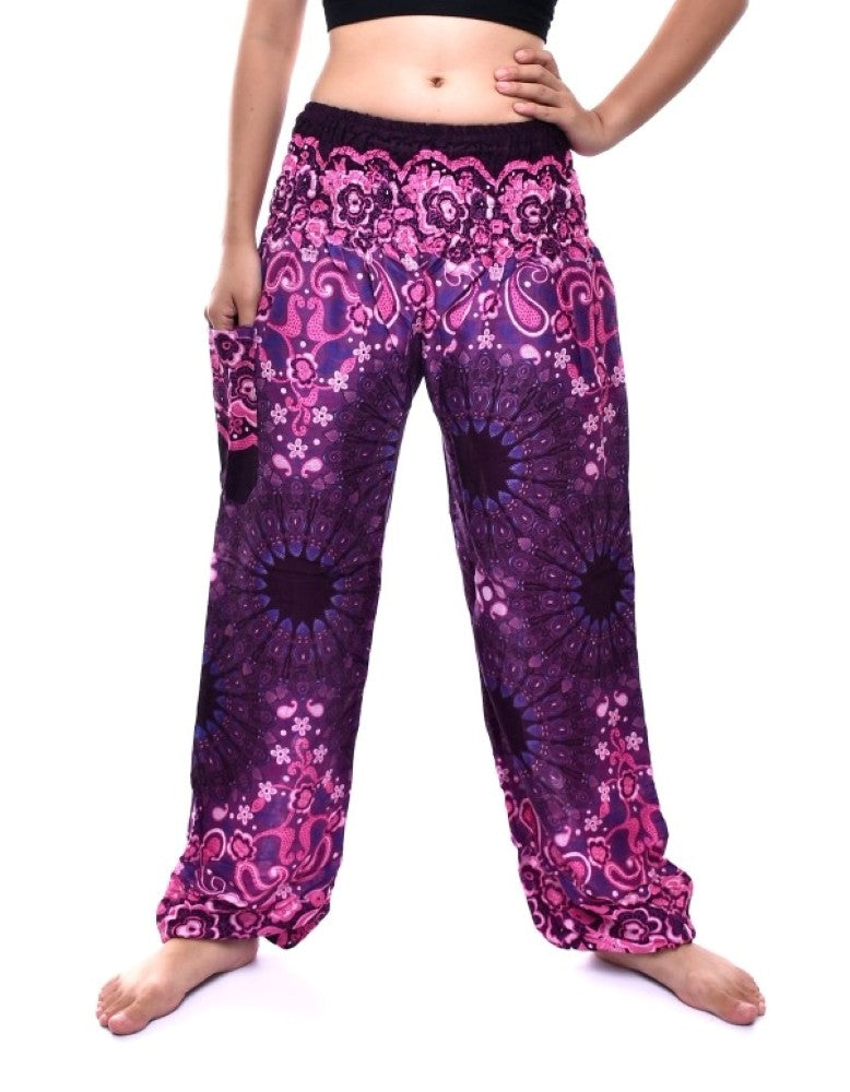 Bohotusk Purple Ink Splash Print Women's Trousers with elasticated smocked waist and ankle cuffs, showcasing vibrant colors and a stylish design.