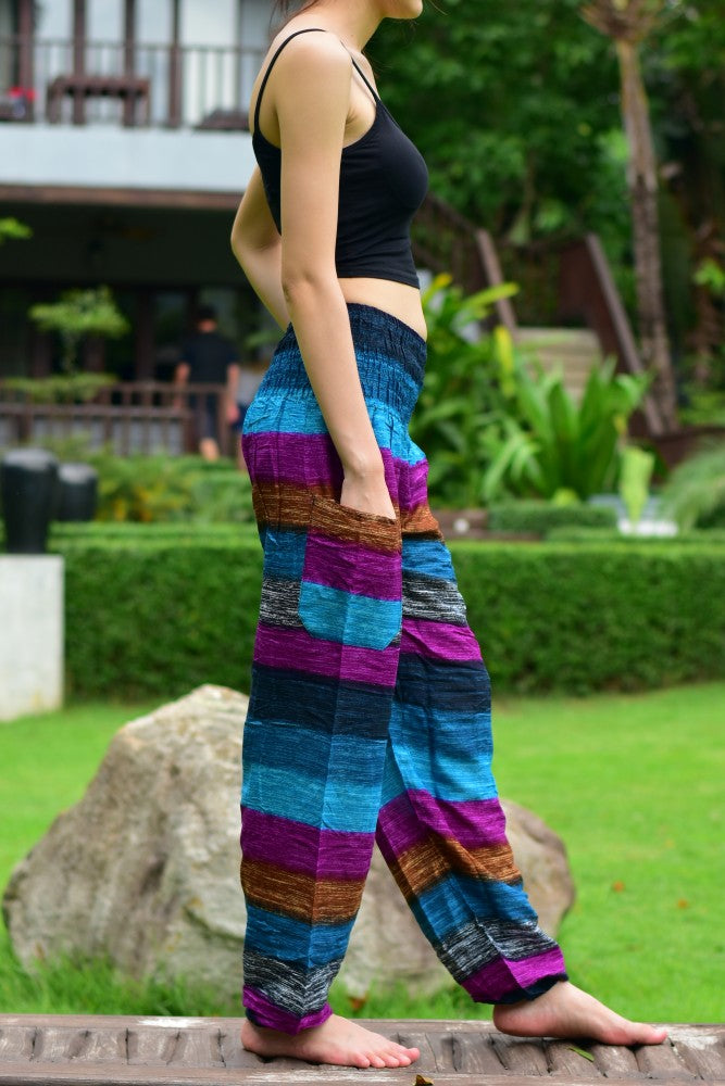 Bohotusk Purple Multi Stripe Print Elasticated Smocked Waist Women's Trousers, showcasing vibrant colors and a comfortable design.