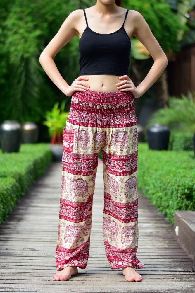 Bohotusk Red Elephant Herd Print Women's Trousers with elasticated smocked waist, showcasing vibrant colors and unique design.