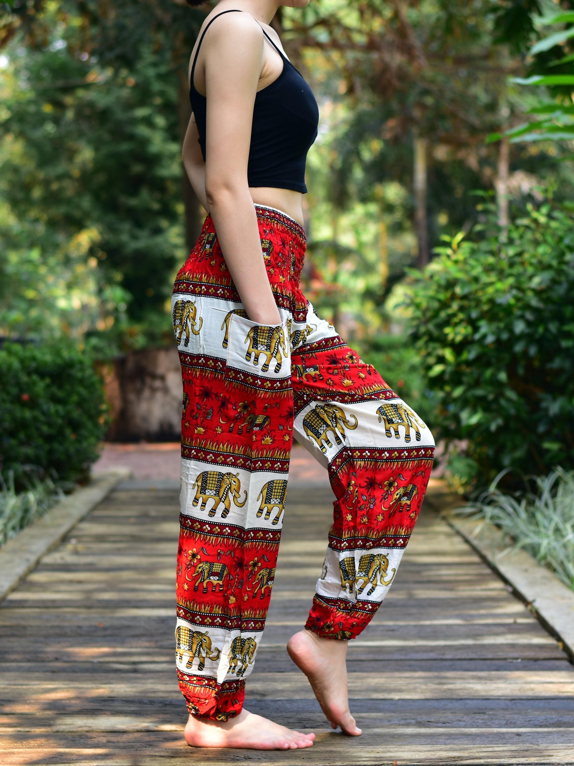 Bohotusk Red Elephant Stripes Print Women's Trousers with elasticated smocked waist, showcasing vibrant colors and comfortable design.