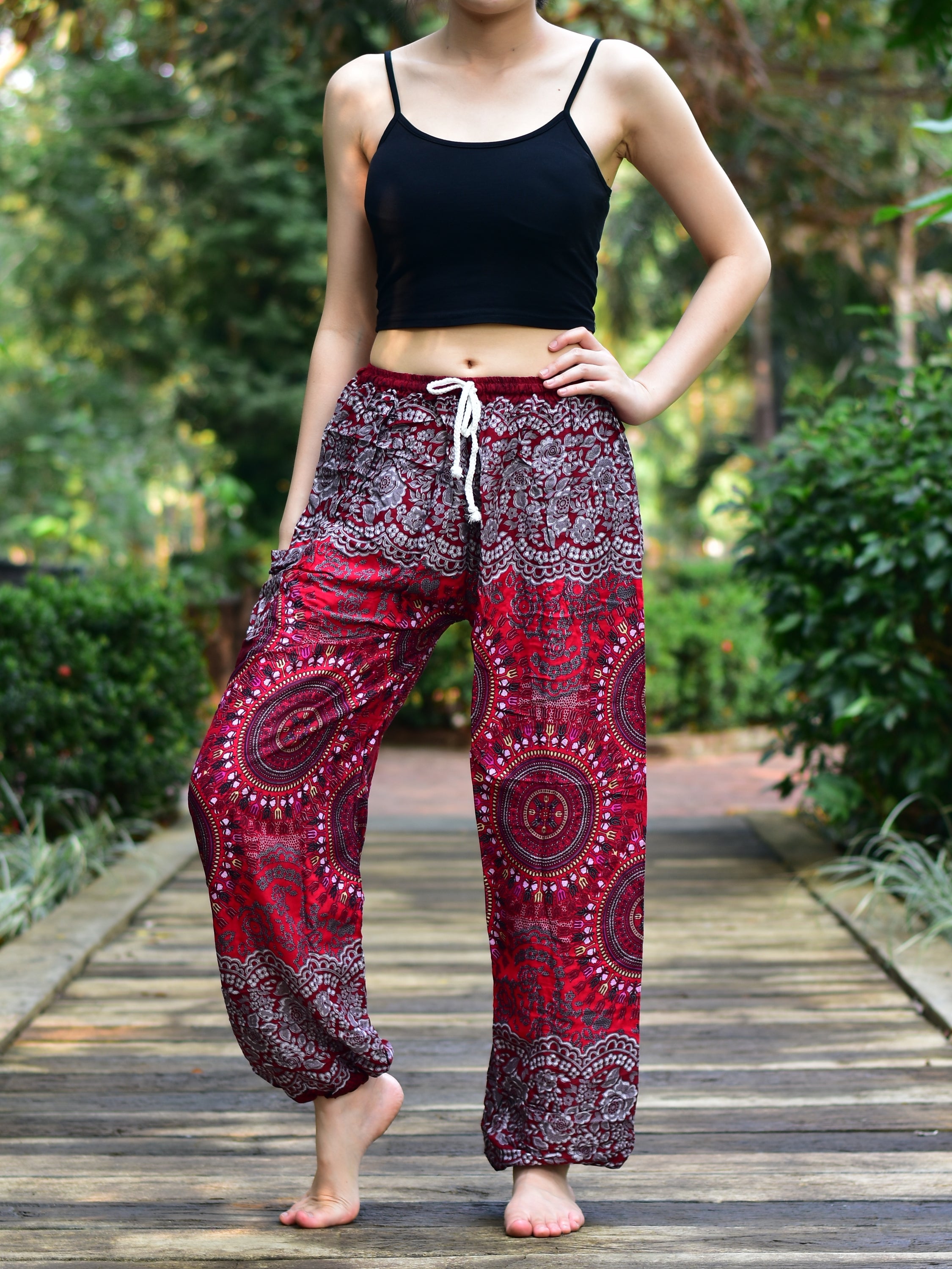 Bohotusk Red Sun Beam Print Women's Harem Pants featuring a tie waist and elasticated ankles, made from lightweight Thai Rayon.