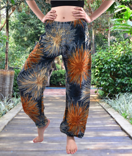 Bohotusk Teal Firework Print Womens Harem Pants with elasticated waist and ankles, showcasing vibrant colors and a stylish design.