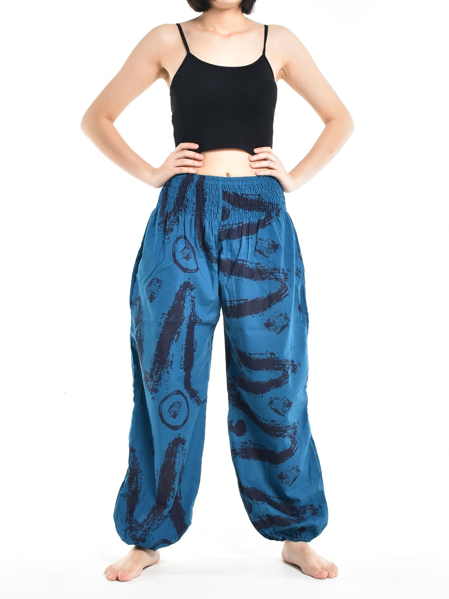 Bohotusk Women's Autumn Blue Swirl Cotton Harem Pants displayed on a model, showcasing the elasticated waist and vibrant print.