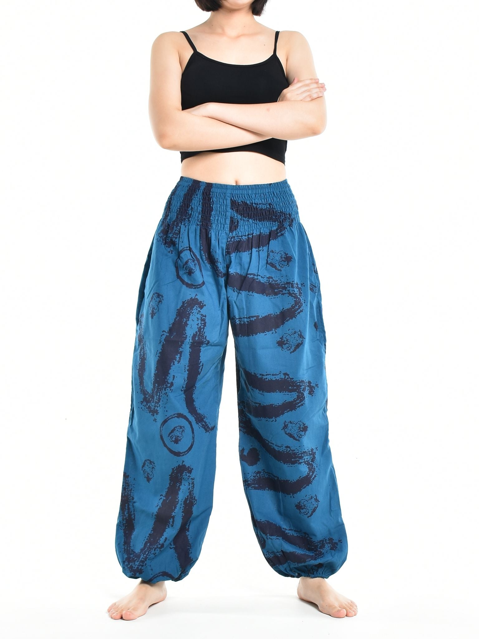 Bohotusk Women's Autumn Blue Swirl Cotton Harem Pants displayed on a model, showcasing the elasticated waist and vibrant print.