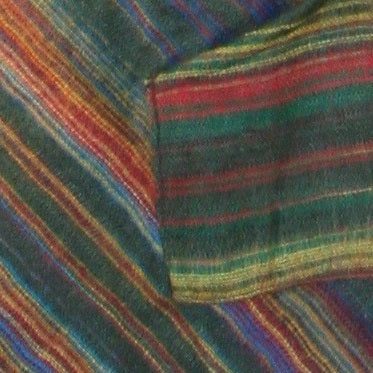 Forest Green Red Blue Stripe Woollen Poncho with front pockets and hood, showcasing its stylish design and cozy fabric.