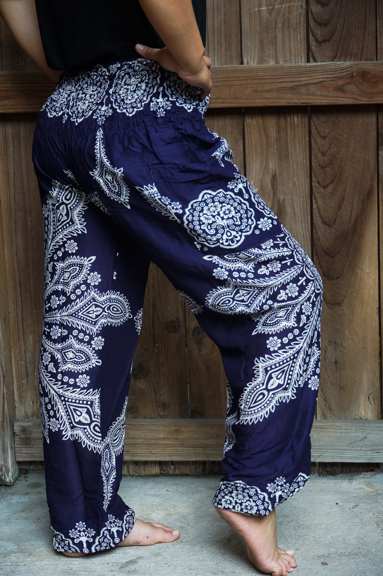 Purple Butterfly Harem Pants made of lightweight rayon, featuring an elastic waist and ankle, perfect for casual and active wear.