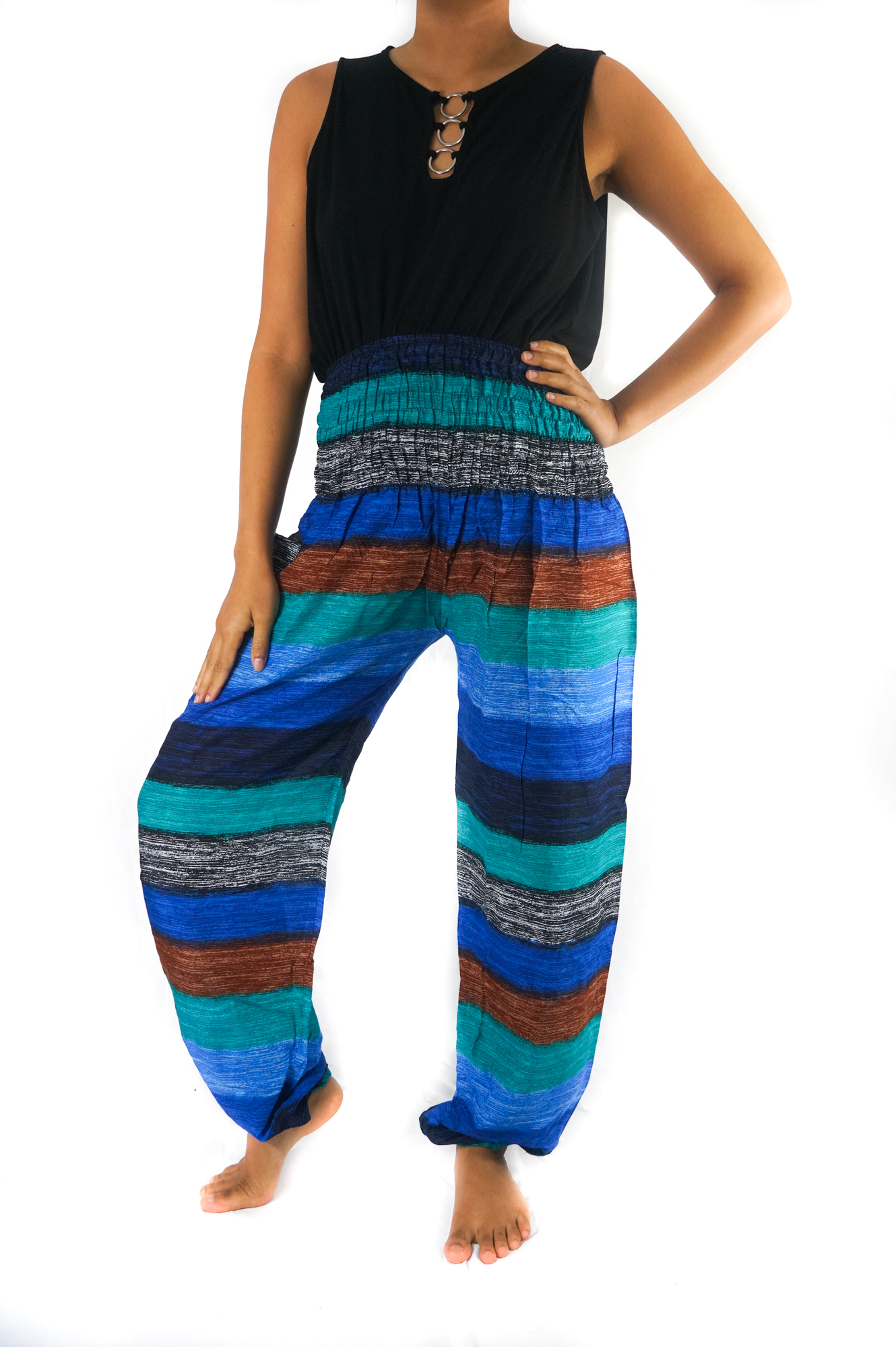A pair of colorful Stripe Boho Pants made from lightweight rayon, featuring an elastic waist and ankle, with a side pocket, perfect for yoga and casual wear.