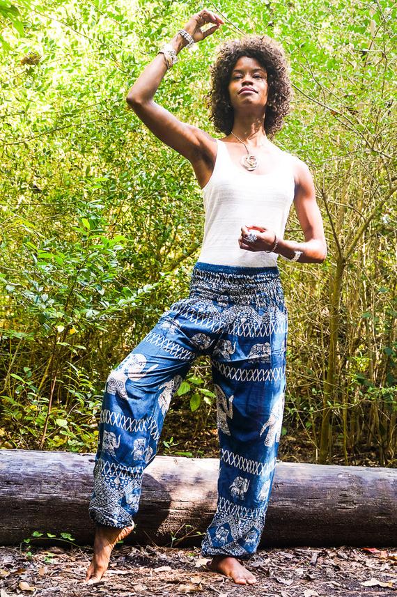 Teal Elephant Harem Pants for women, featuring a vibrant elephant pattern, elastic waist, and side pocket, made from breathable rayon fabric.