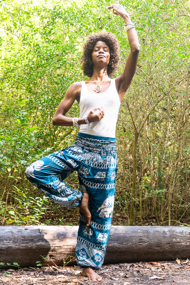 Teal Elephant Harem Pants for women, featuring a vibrant elephant pattern, elastic waist, and side pocket, made from breathable rayon fabric.