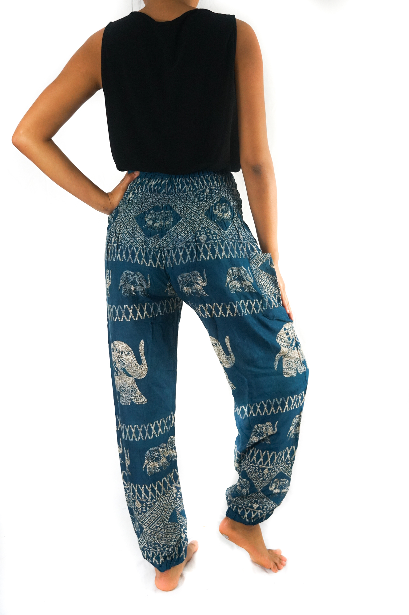 Teal Elephant Harem Pants for women, featuring a vibrant elephant pattern, elastic waist, and side pocket, made from breathable rayon fabric.