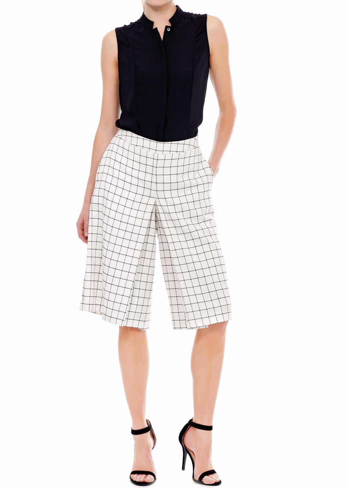 A pair of women's wide leg pants in square jacquard pattern, featuring pleated inseam and hidden side pockets.