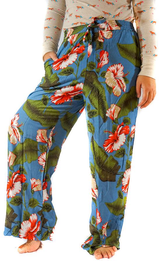 A pair of women's XS-M leaf print pants made from lightweight rayon, featuring a drawstring waist and two side pockets, perfect for boho-chic style.