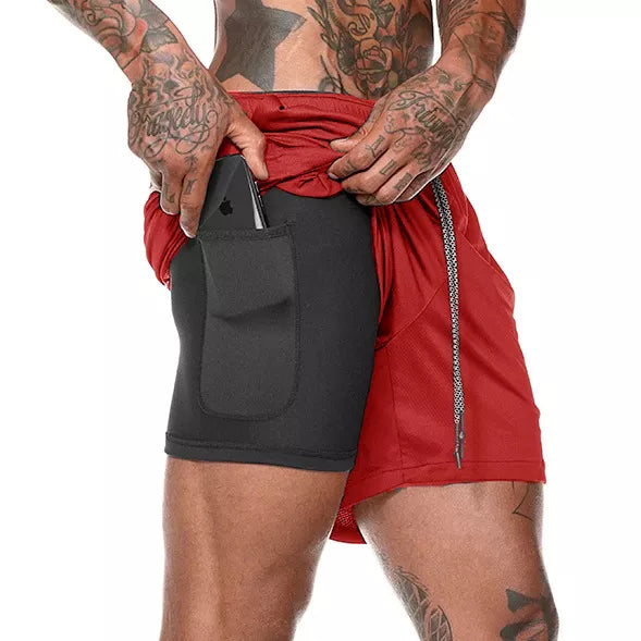 Fit Guy Beach Shorts in solid color, made of polyester, suitable for beach and gym activities, featuring an elastic waistband for comfort.