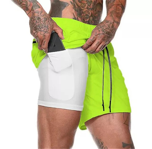 Fit Guy Beach Shorts in solid color, made of polyester, suitable for beach and gym activities, featuring an elastic waistband for comfort.