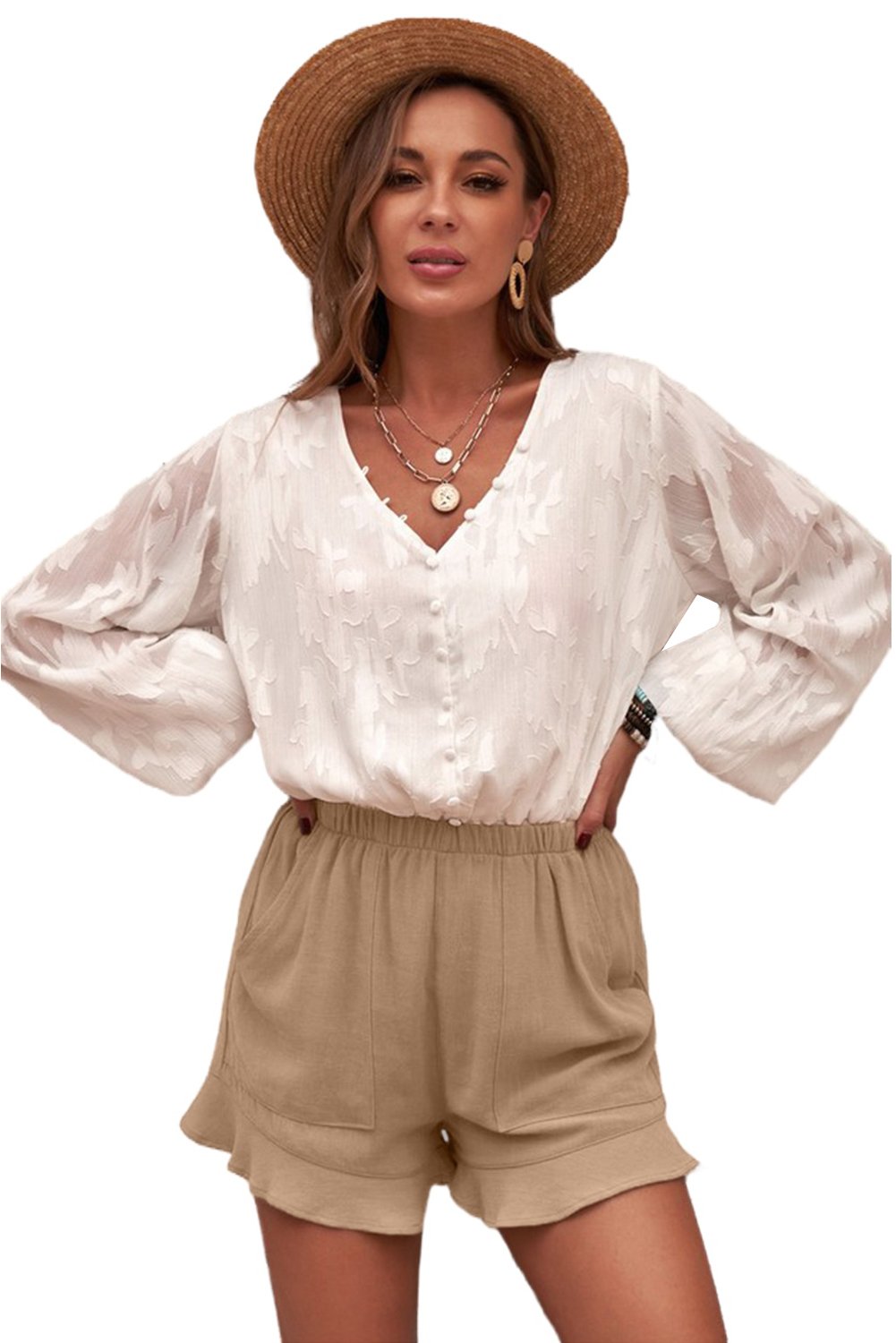 A pair of women's khaki shorts featuring ruffled details and side pockets, made from breathable linen cotton blend, perfect for summer wear.