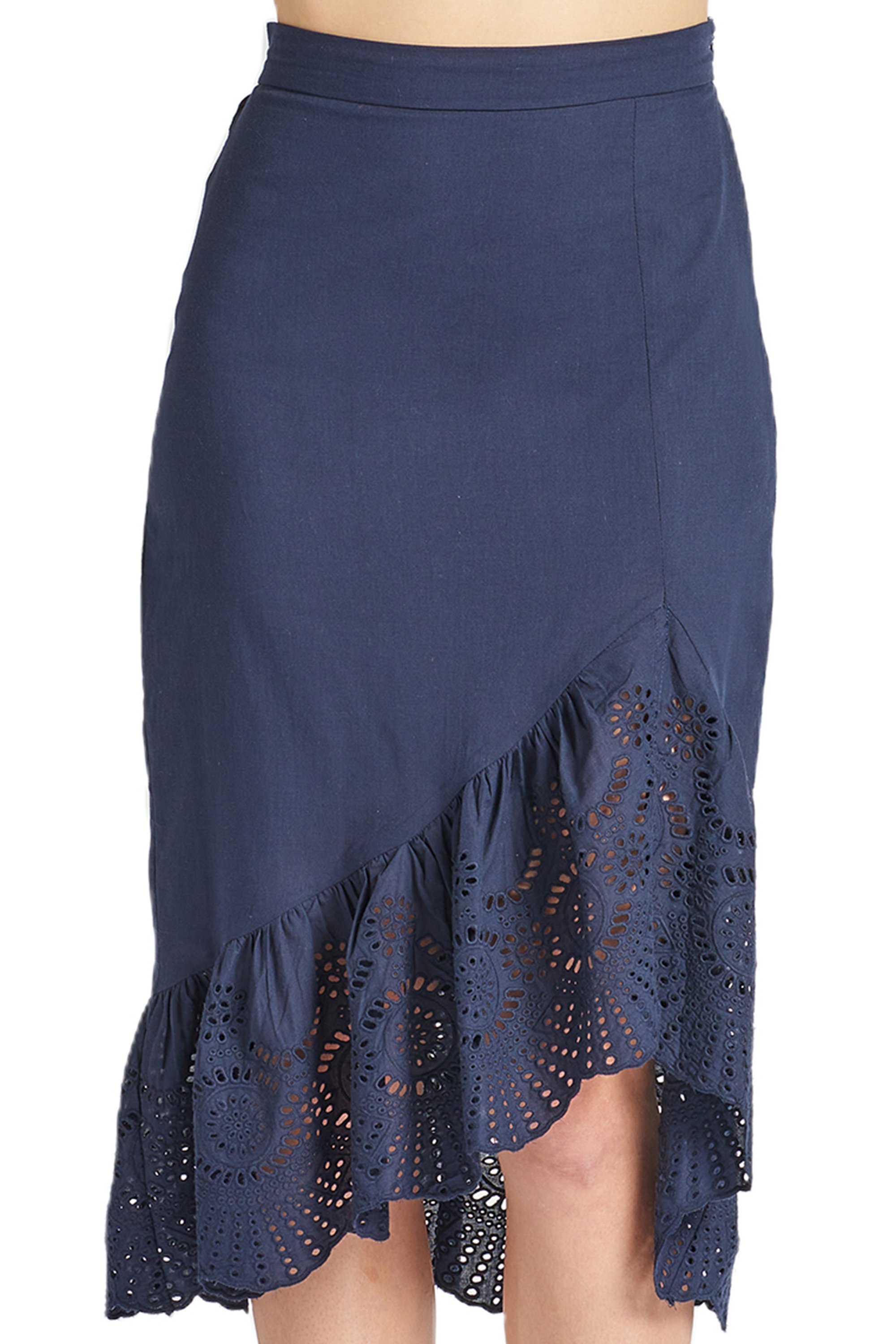 Aster Skirt in navy featuring cotton eyelet fabric, asymmetric hi-lo design, and scalloped ruffle hem, perfect for summer outings.