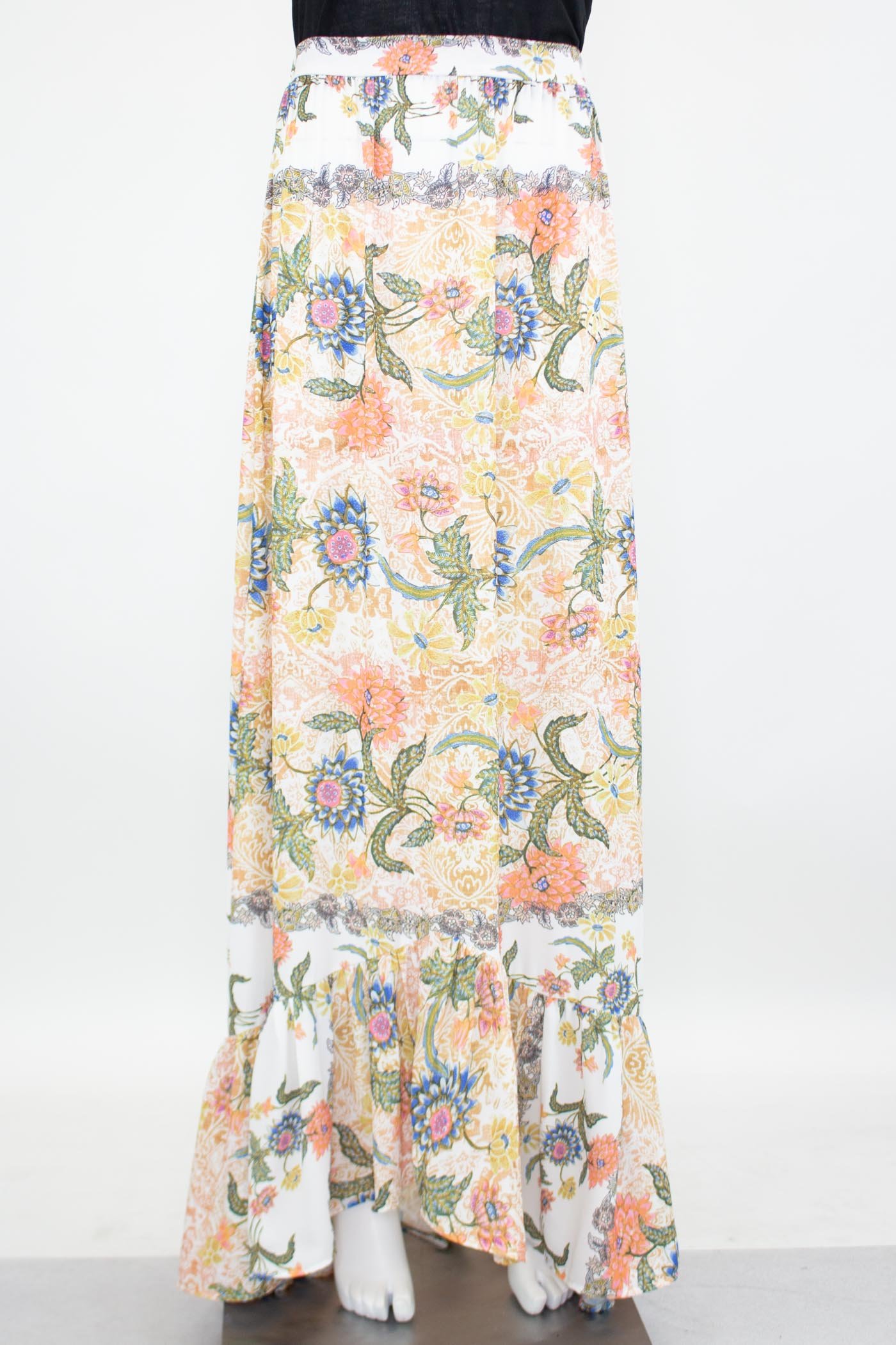 A stylish flared bottom floral maxi skirt featuring a vibrant floral print and an elastic waistband, perfect for casual and semi-formal occasions.