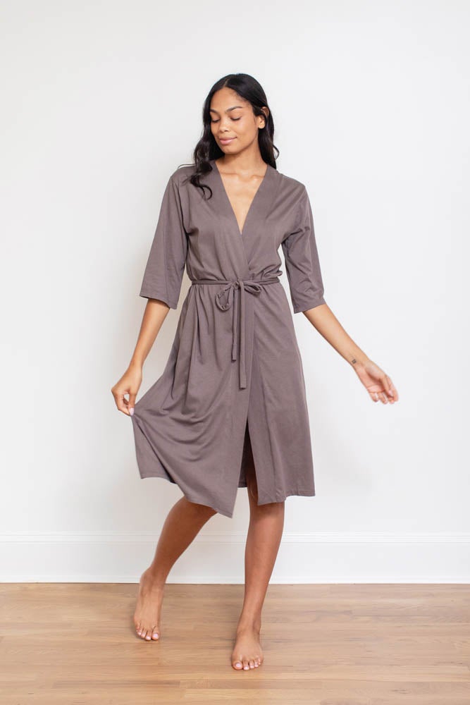 PIMA Short Robe made from soft, organic cotton, showcasing its elegant design and comfortable fit.