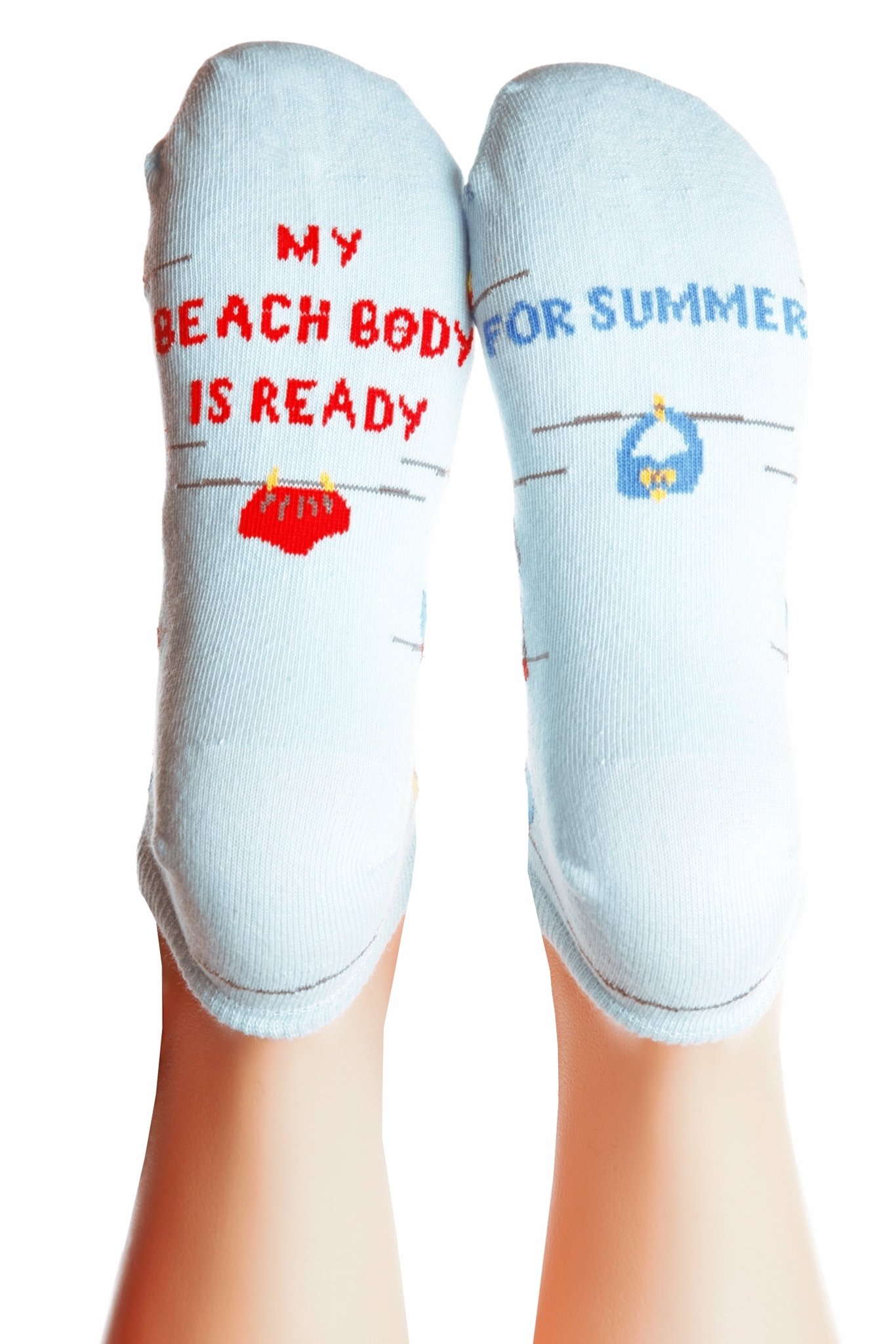 Light blue cotton socks for women with a knitted pattern and motivational writing on the sole, perfect for summer.