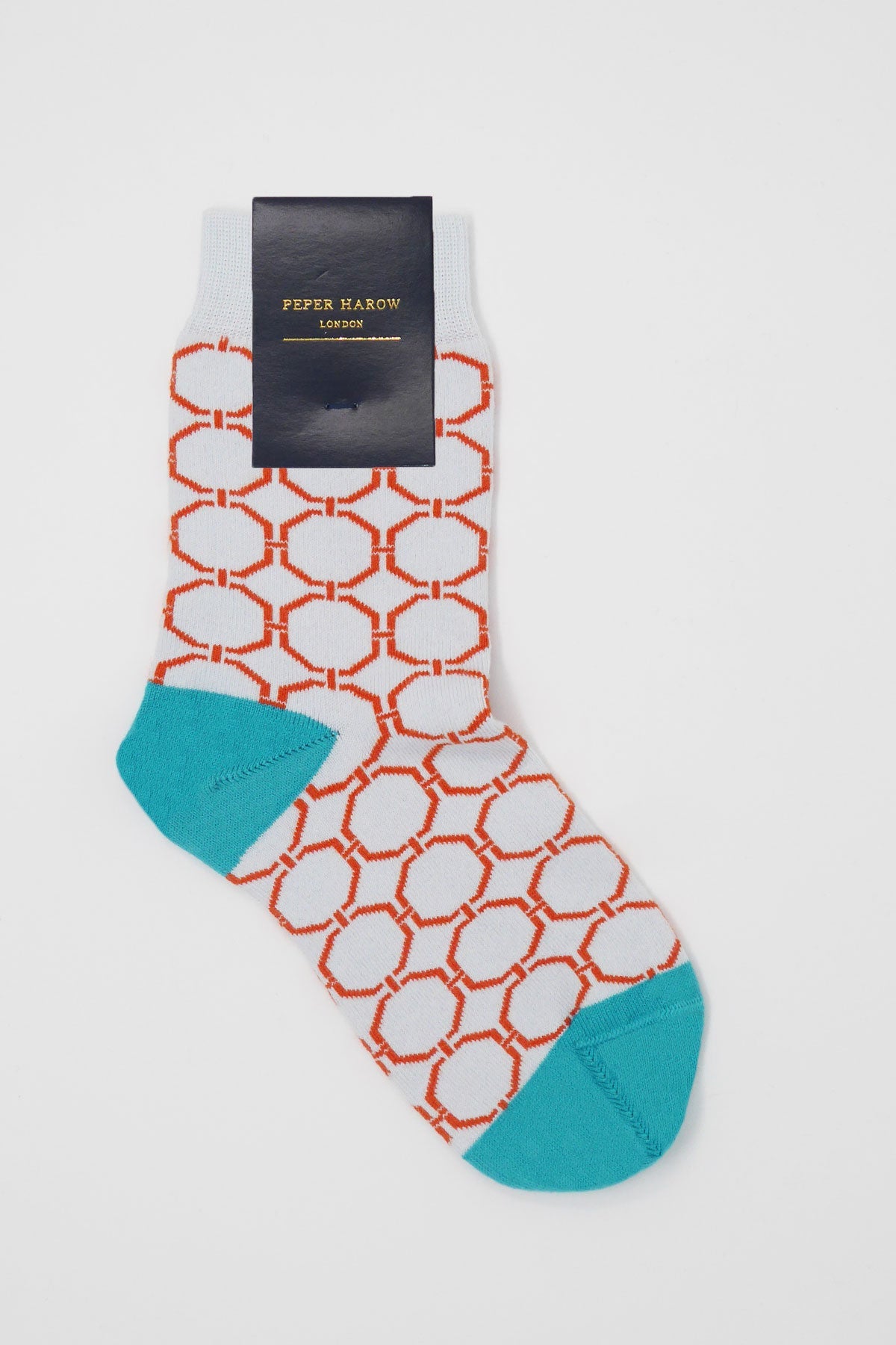 Beehive Women's Socks in grey with orange beehive pattern and aqua heel and toe, showcasing luxurious Supima cotton.