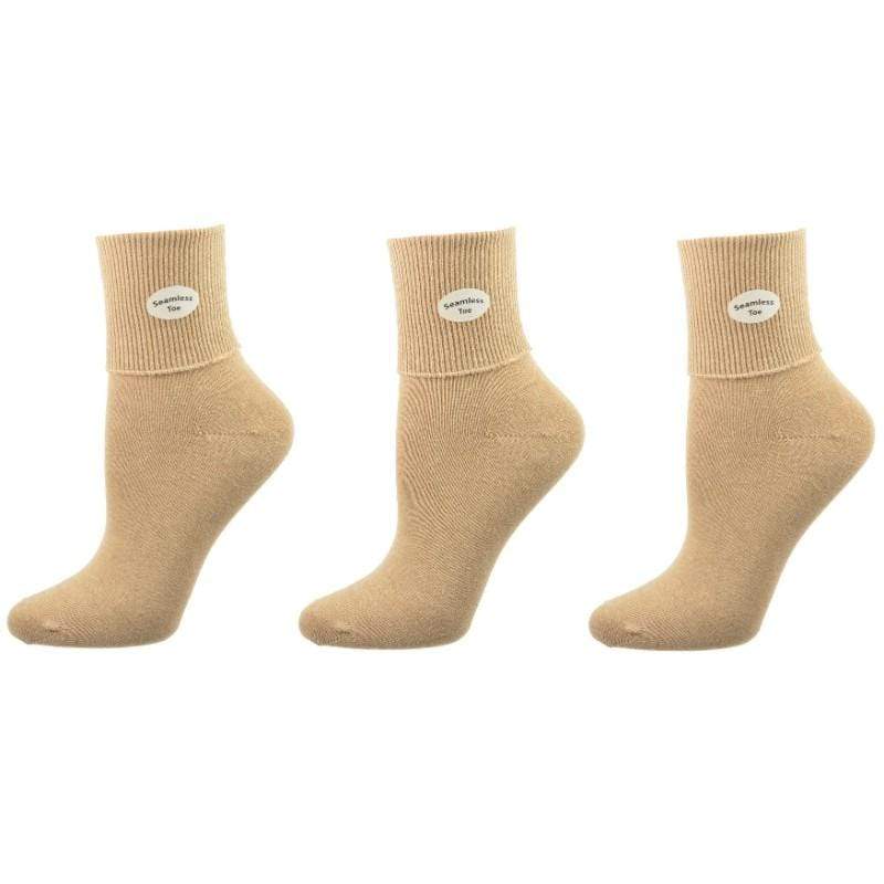 Three pairs of Classic Ribbed Single Cuff Pima Cotton Socks in assorted colors, showcasing their ribbed texture and soft fabric.