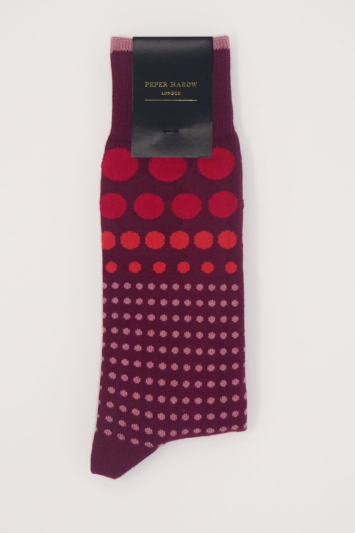 Burgundy Grad Polka Men's Socks featuring a polka dot design with red, orange, and pink dots in varying sizes.
