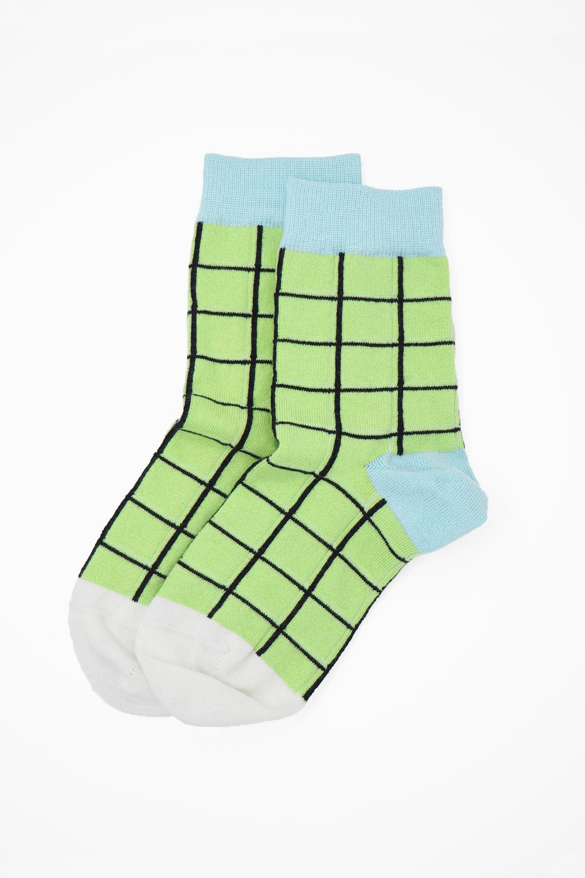 A pair of stylish Grid Women's Socks in pastel lime green and sky blue, showcasing a symmetrical grid pattern, perfect for any outfit.