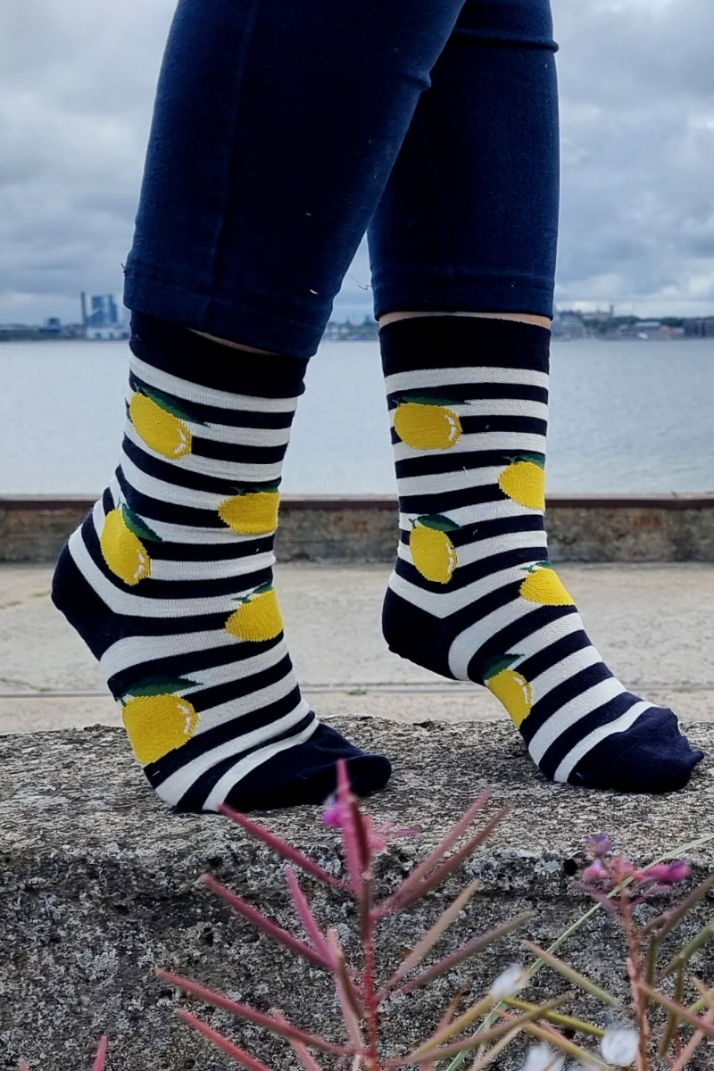LEMON merino wool unisex socks featuring vibrant lemon patterns and blue-white stripes, perfect for all seasons.