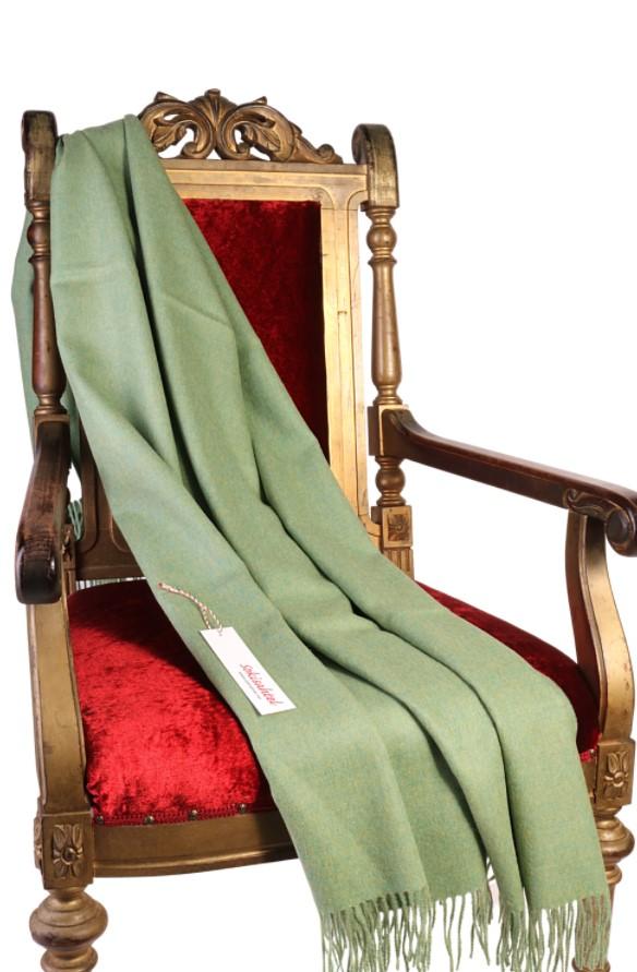 Luxurious light green alpaca wool plaid, hand-crafted from 100% alpaca wool, perfect for autumn-winter comfort.