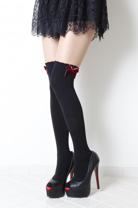 Marlene over the knee highs featuring a large red velour bow, stylish and elegant design for women.