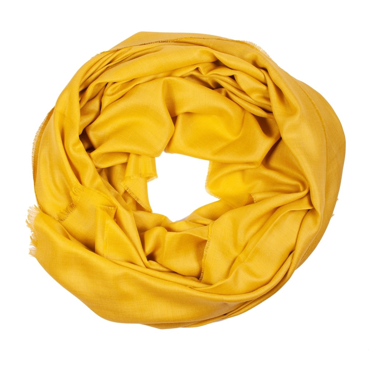 Luxurious mustard shawl made from 70% royal alpaca wool and 30% silk, showcasing its soft texture and elegant design.