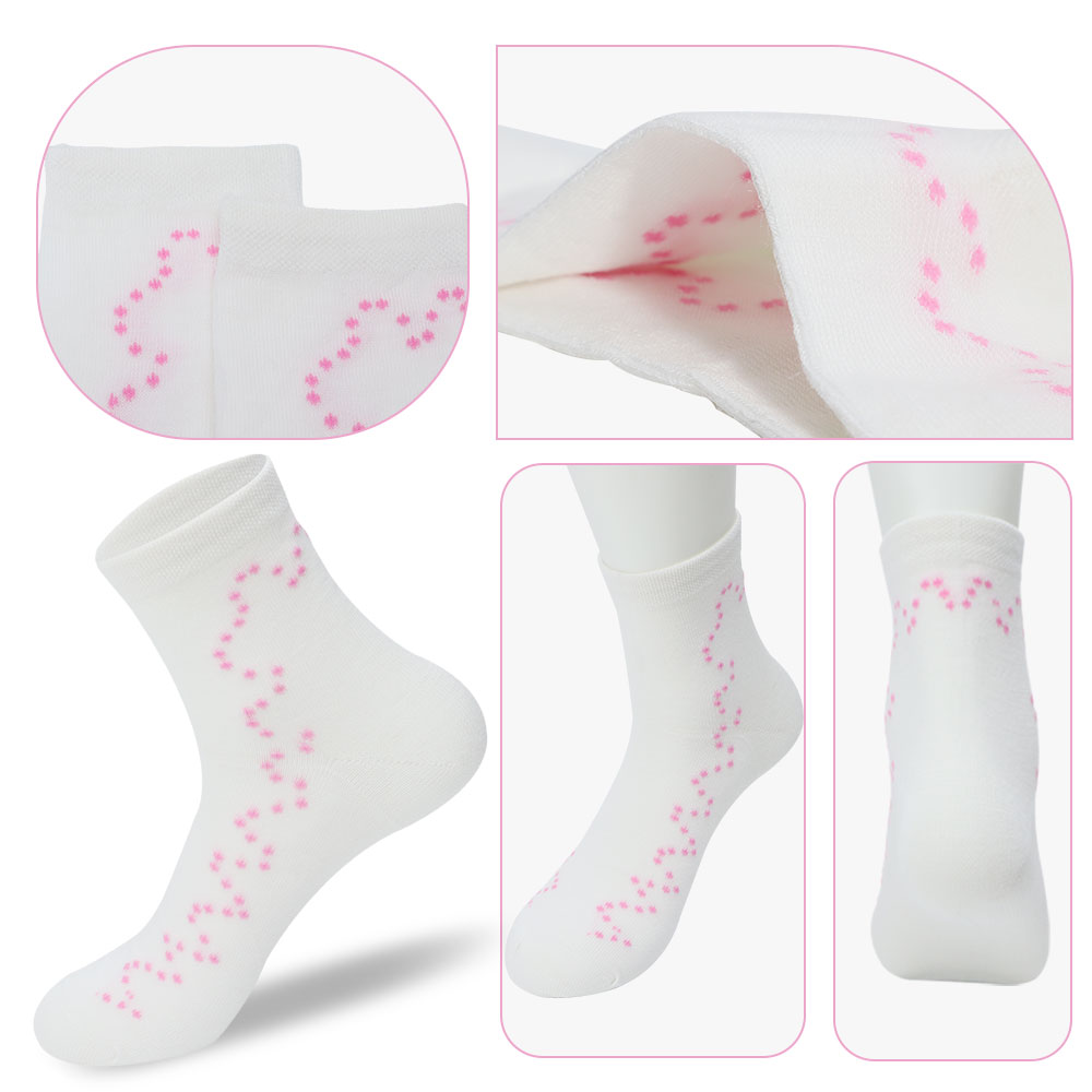 A pair of cute pink dot curve solid color socks in white, showcasing a playful design suitable for all-match styles.