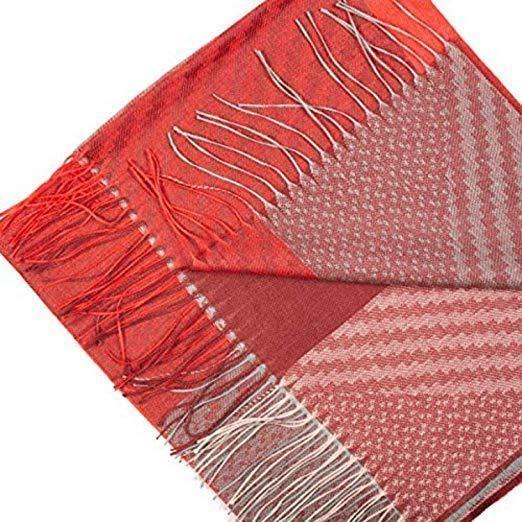 Luxurious red checkered alpaca wool and silk shawl, showcasing its soft texture and elegant design.