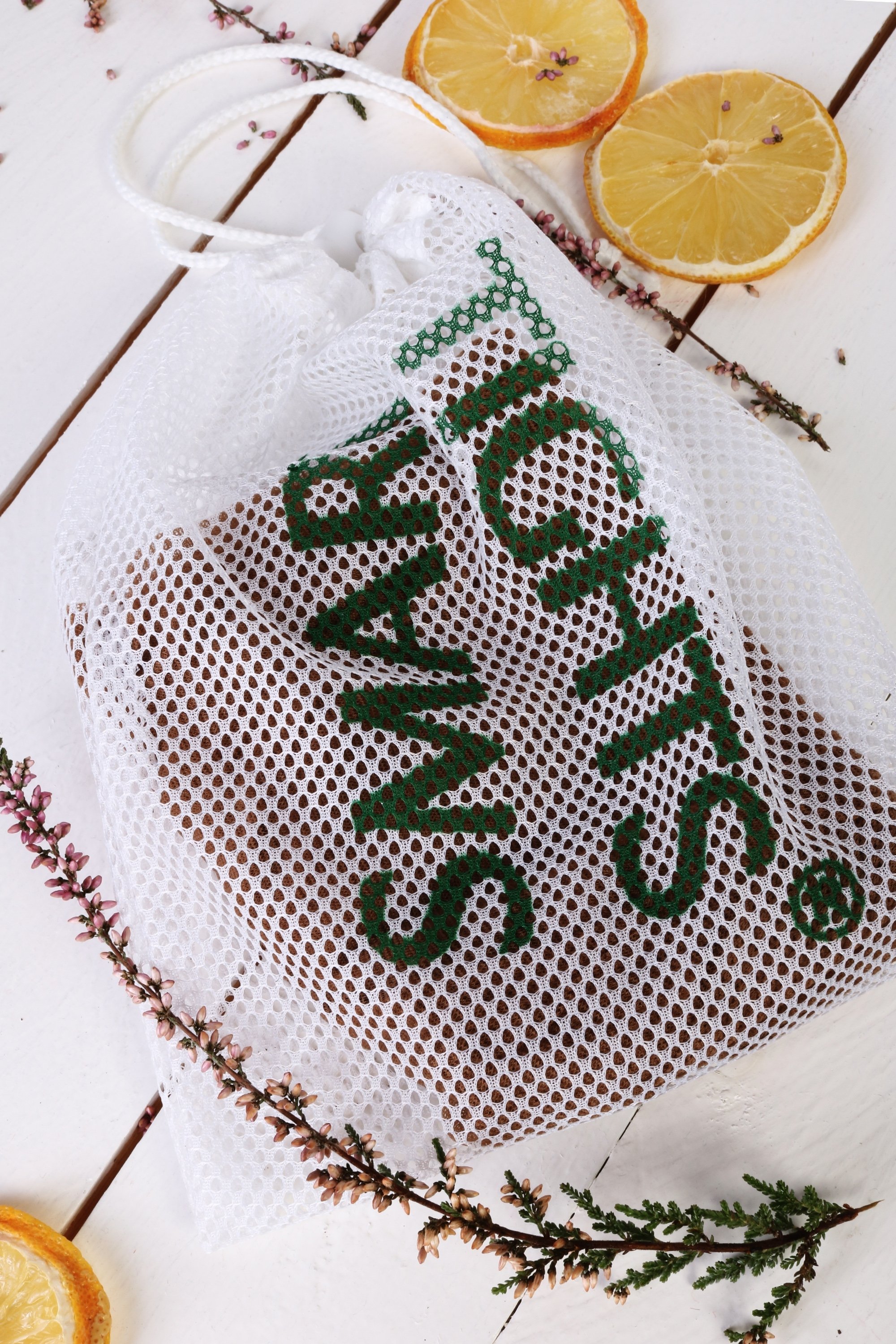 A pair of black 30 DEN SMART TIGHTS made from biodegradable yarn, showcasing their eco-friendly design and OEKO-TEX® certification.