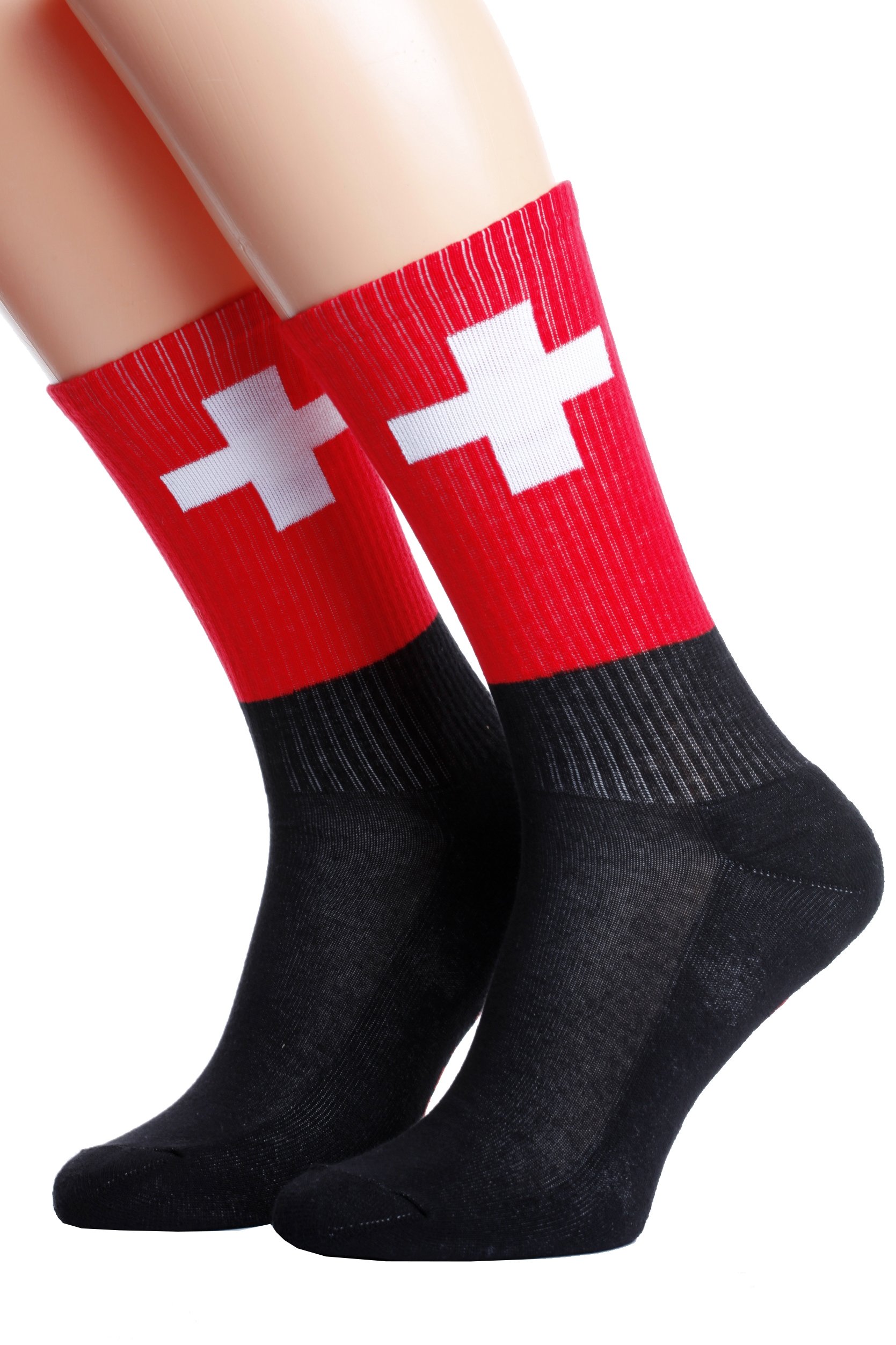 A pair of black cotton socks featuring the Swiss flag design and the word 'SWITZERLAND' knitted on the sole.