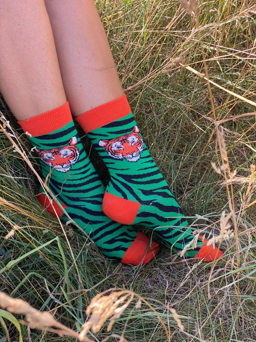 TIGER green socks featuring a playful tiger face design with elegant stripes, made from a soft cotton blend.