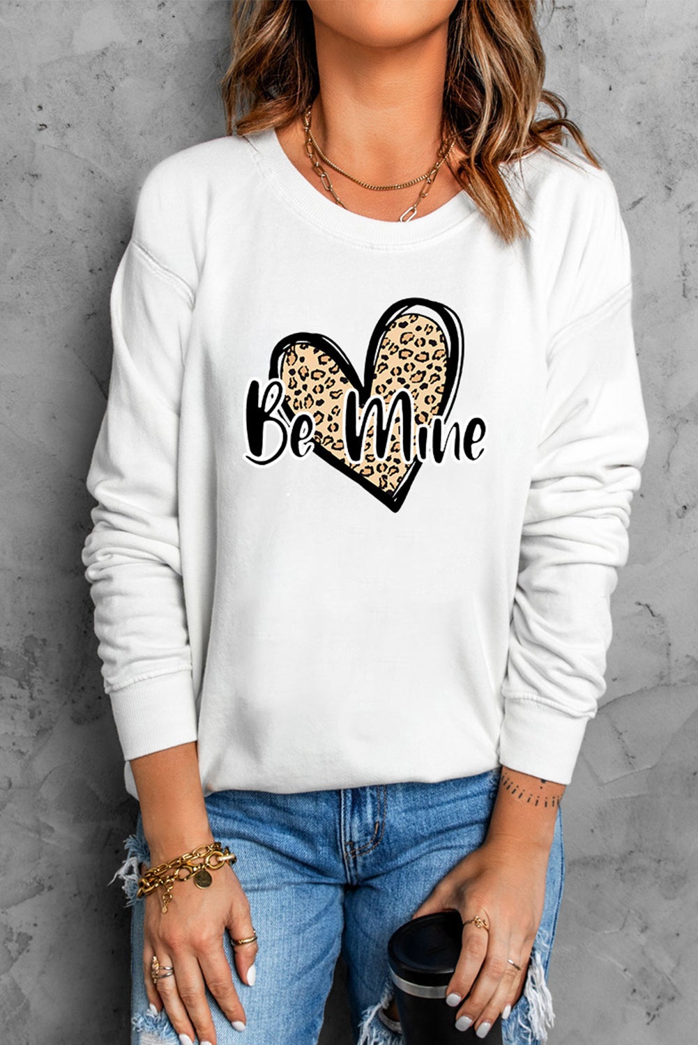 Be Mine Leopard Heart Print Sweatshirt featuring a stylish leopard heart design, long sleeves, and a round neckline, perfect for autumn and winter wear.
