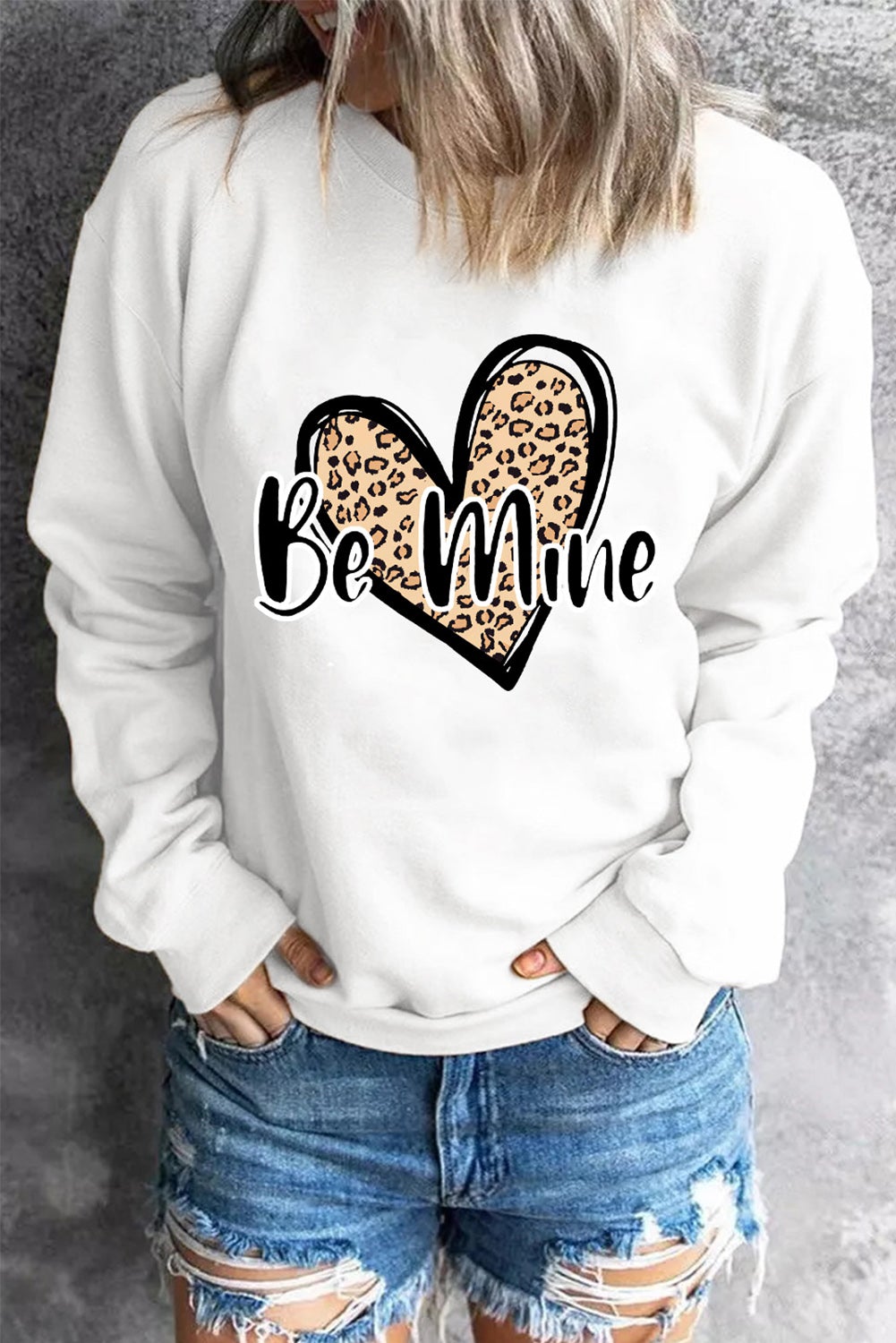 Be Mine Leopard Heart Print Sweatshirt featuring a stylish leopard heart design, long sleeves, and a round neckline, perfect for autumn and winter wear.