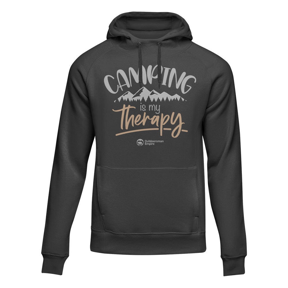 A cozy unisex hoodie featuring the phrase 'Camping Is My Therapy', perfect for outdoor enthusiasts.