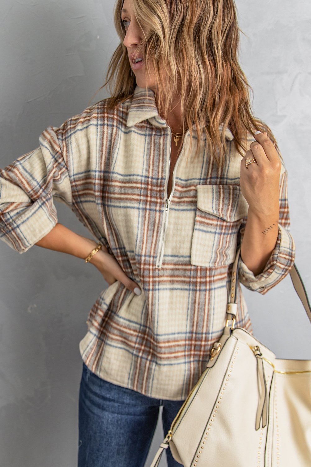 Chest Pocket Plaid Sweatshirt featuring an oversized fit, half zipper closure, and classic plaid pattern, perfect for fall and winter wear.
