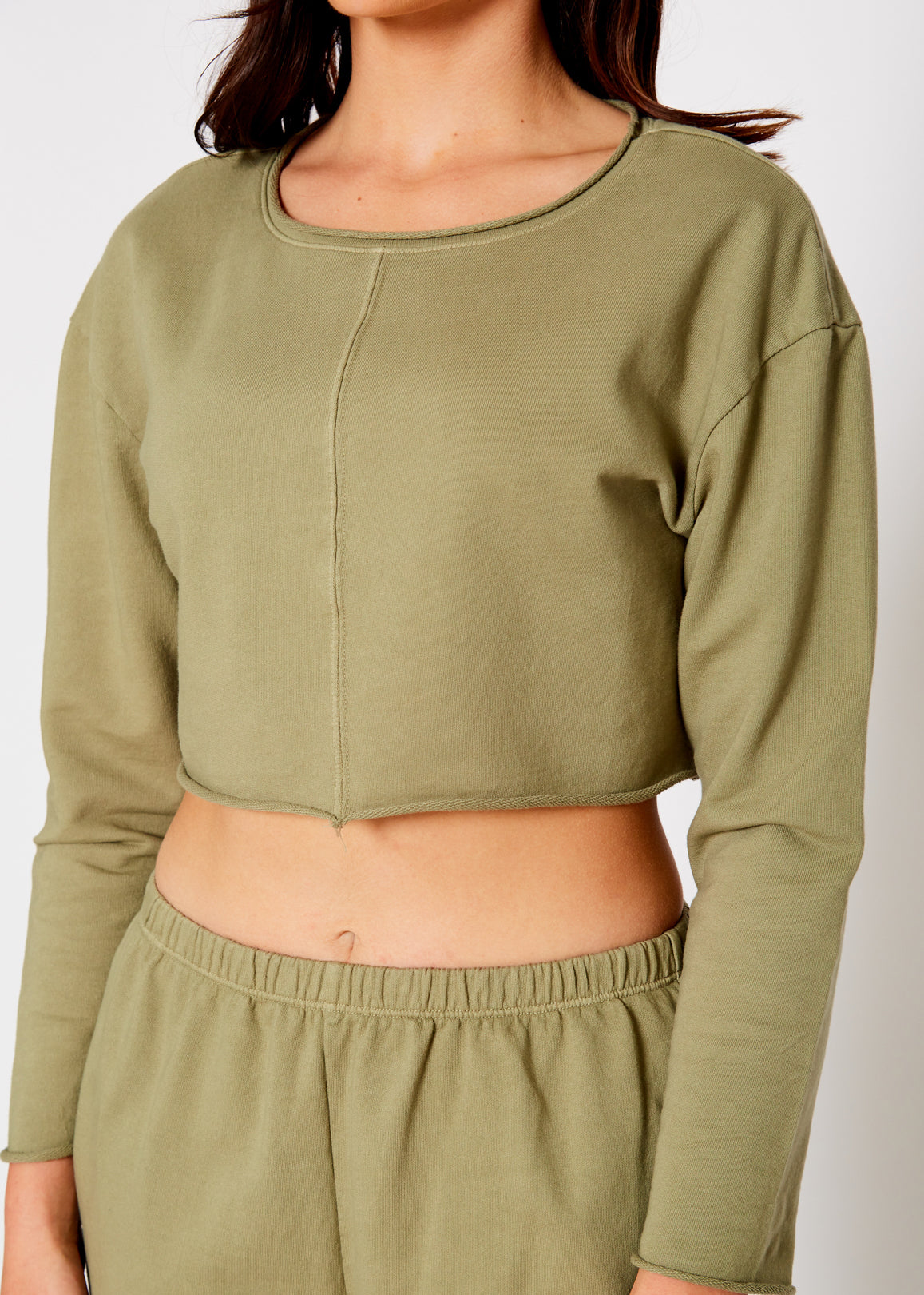 Cropped Scoop Neck Terry Sweatshirt in Olive, featuring a relaxed fit and raw hem details, made from 100% cotton.