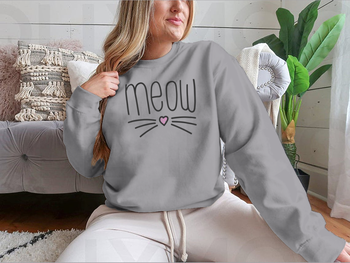 A stylish t-shirt featuring a cute cat quote vector illustration, made from 100% cotton, showcasing a classic fit and midweight fabric.