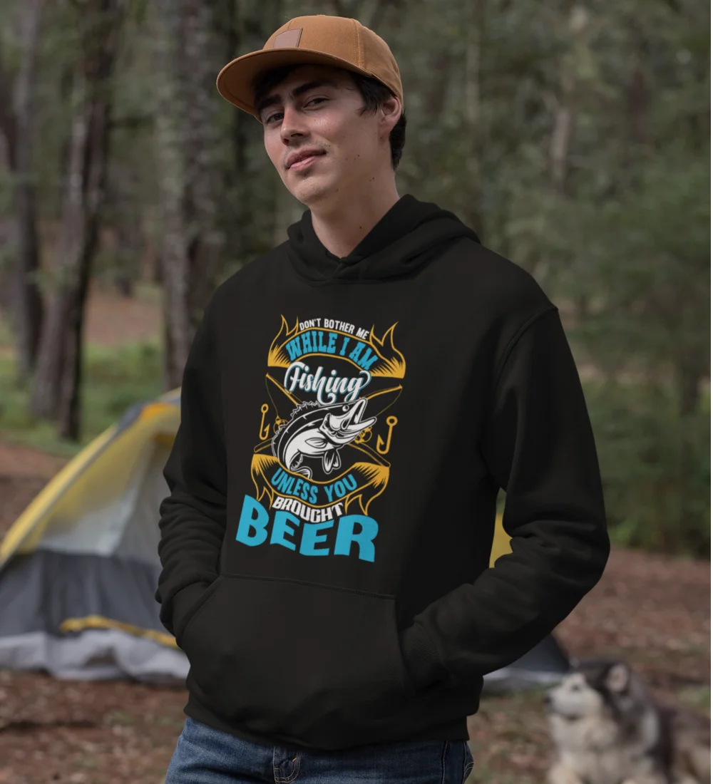 A cozy unisex hoodie featuring the phrase 'Don't Bother Me While I'm Fishing', perfect for fishing enthusiasts.