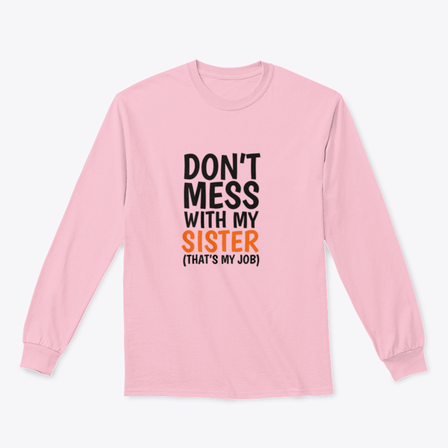 A cozy sweatshirt featuring the phrase 'Don't Mess With My Sister That's My Job' in bold lettering, showcasing a classic fit and midweight fabric.