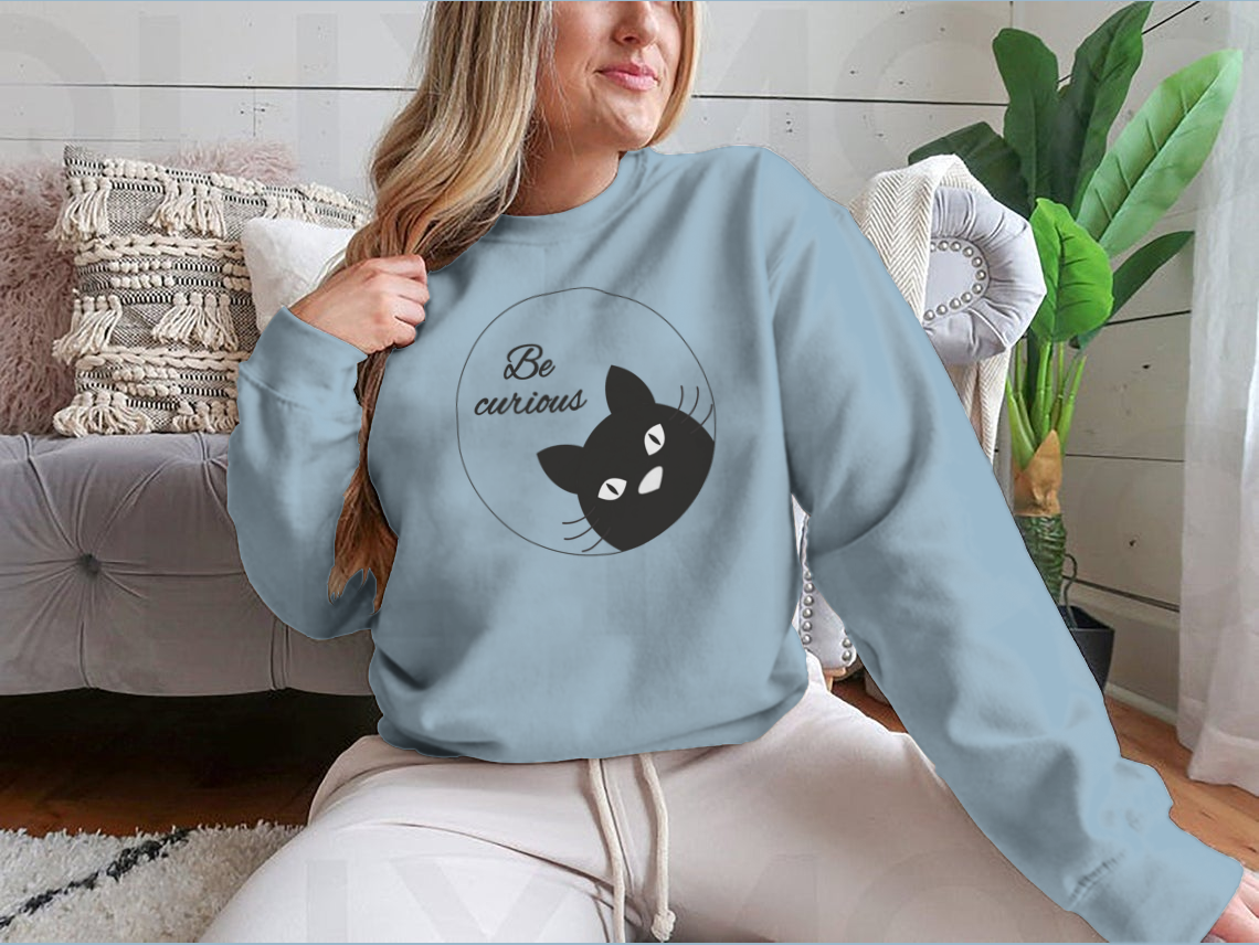 A cute black cat face cartoon character design on a greeting card, showcasing its playful and charming features.